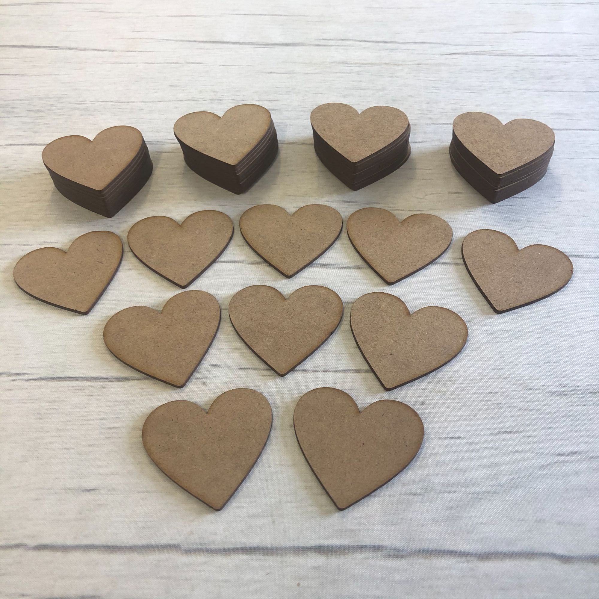 Embellishments set of 50 hearts 5cm Wooden Craft Shape