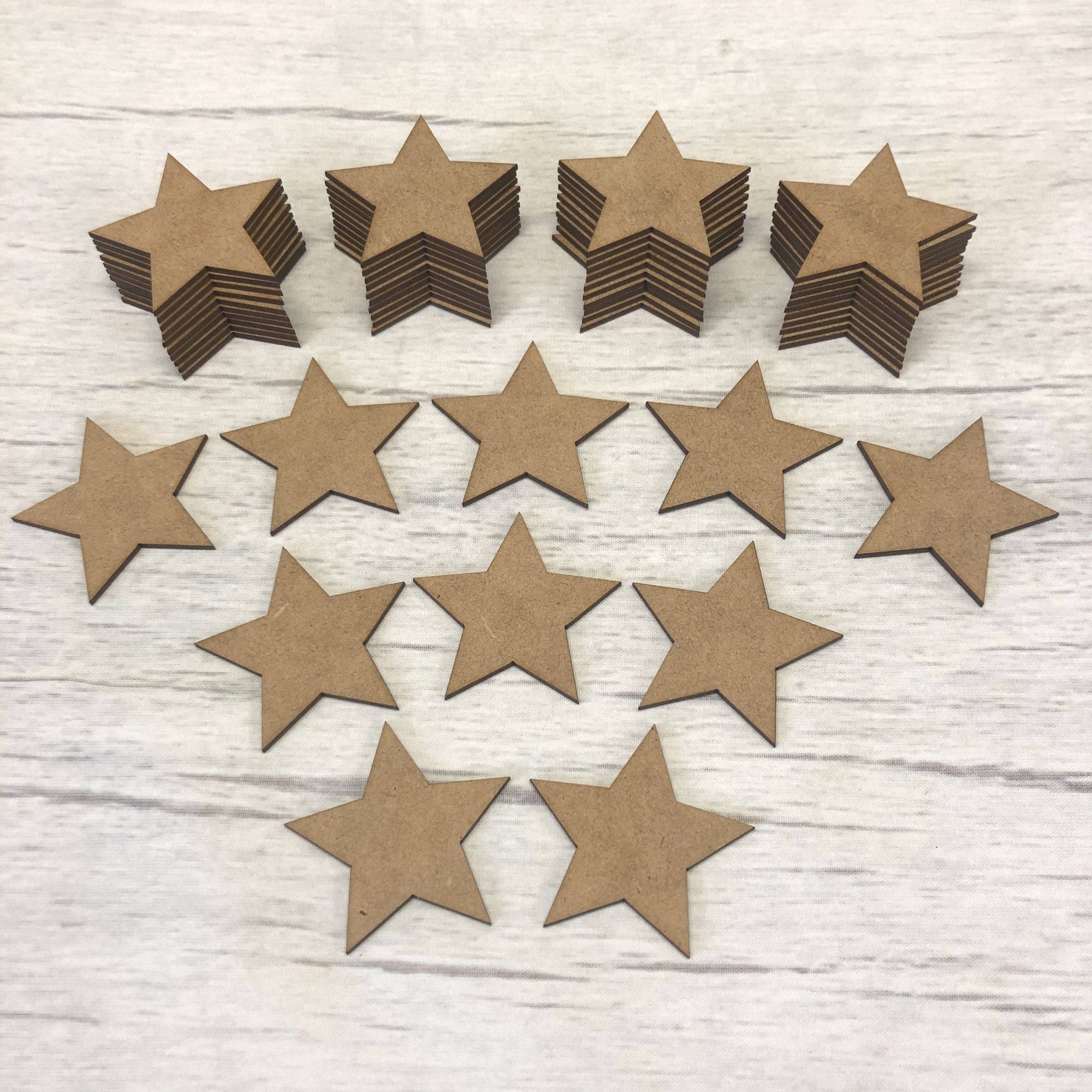 Embellishments set of 50 stars 5cm Wooden Craft Shape