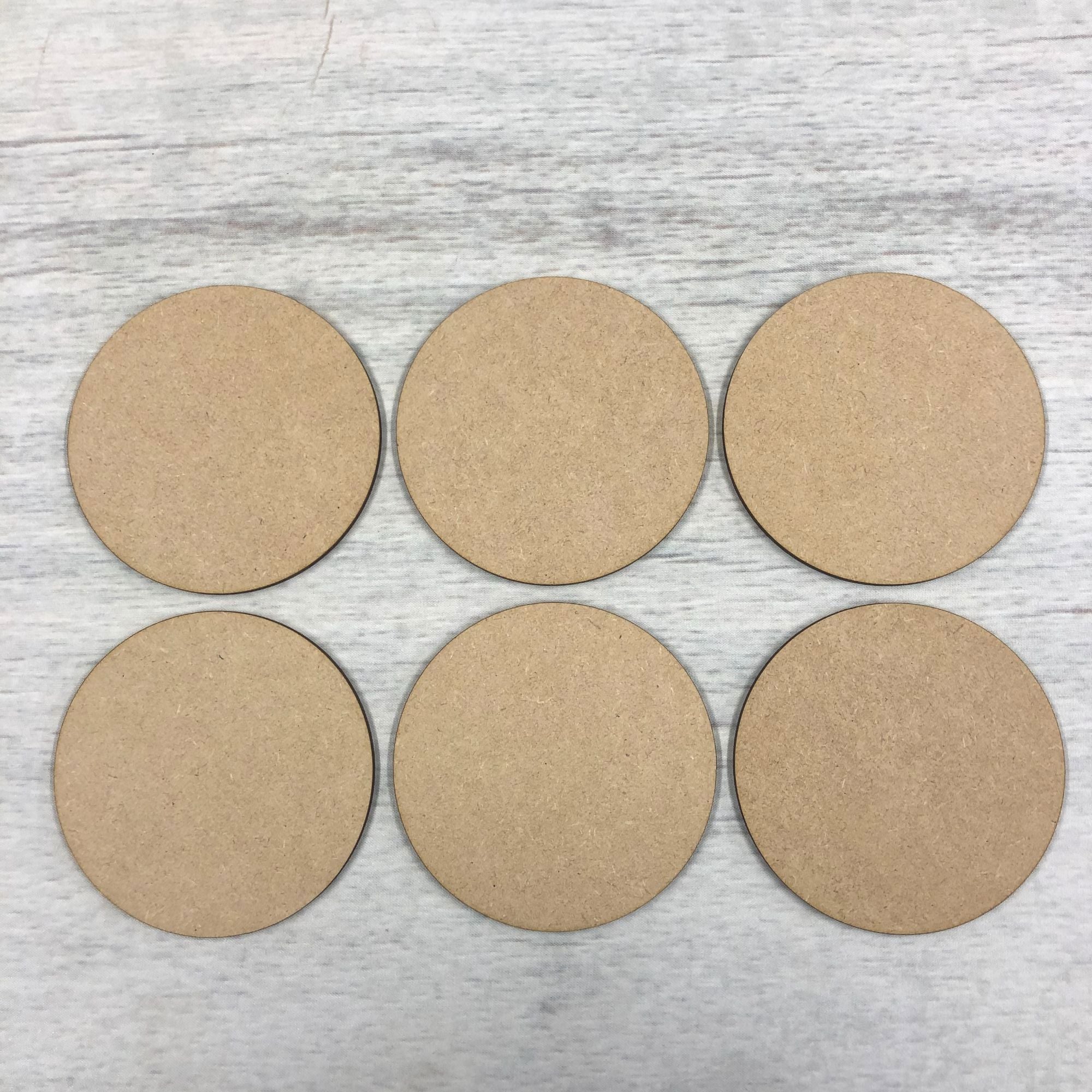 Coasters, set of six round blank shapes